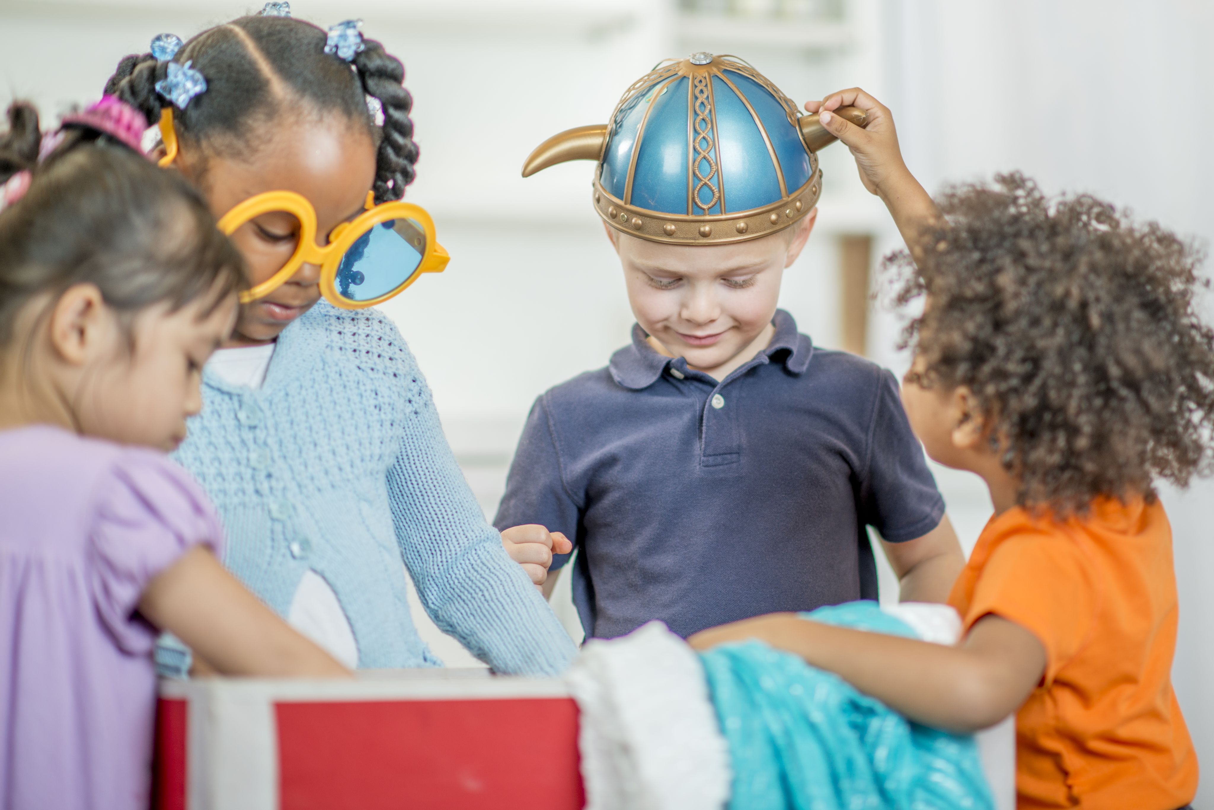 Group of children wearing different costumes including a viking hat
